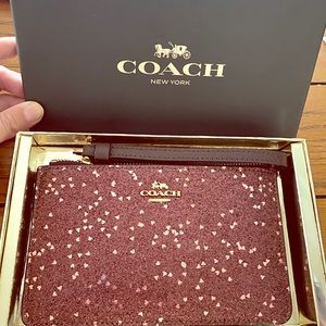 Pink sparkle Coach clutch